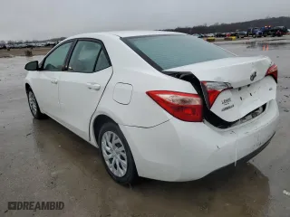2019 Toyota Corolla L with VIN 5YFBURHE6KP884410, listed as a Copart auction lot 86710474 with 105,265 mi miles and Salvage Title. Bid and sale history available at carsss.com. Image 2.