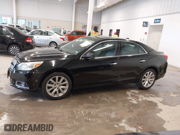 2013 Chevrolet Malibu LTZ with VIN 1G11H5SA1DU129095, listed as a IAAI auction lot 41556006 with 170,477 mi miles and . Bid and sale history available at DreamBid. Image 14.