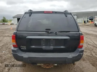 2003 Jeep Grand Cherokee Laredo z VIN 1J4GW48S53C568929, wystawiony jako Copart lot #57604245 z przebiegiem 216 103 mil mil oraz Czysty tytuł • Clean title. Historia ofert i sprzedaży dostępna na DreamBid. Obrazek 6.