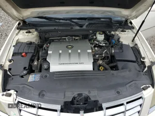2006 Cadillac DTS 1SC z VIN 1G6KD57Y26U177384, wystawiony jako Copart lot #58200665 z przebiegiem 122 356 mil mil oraz Szkoda całkowita • Salvage title. Historia ofert i sprzedaży dostępna na DreamBid. Obrazek 11.