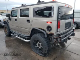 2006 Hummer H2 with VIN 5GRGN23U16H121476, listed as a Copart auction lot 86902654 with 143,202 mi miles and Salvage Title. Bid and sale history available at carsss.com. Image 2.