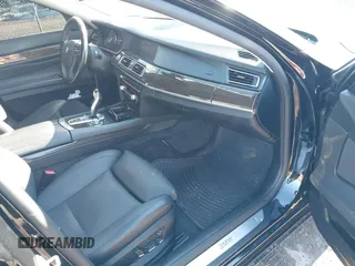 2011 BMW 7 Series 740i with VIN WBAKA4C58BC392020, listed as a IAAI auction lot 41314751 with 116,553 mi miles. Bid and sale history available at carsss.com. Image 5.