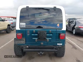1998 Jeep Wrangler Sport with VIN 1J4FY19S7WP787679, listed as a IAAI auction lot 41764883 with 134,144 mi miles. Bid and sale history available at carsss.com. Image 16.