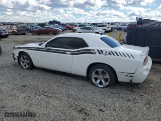 2012 Dodge Challenger SXT Plus with VIN 2C3CDYAG7CH128168, listed as a Copart auction lot 47273945 with 196,025 mi miles and Salvage Title. Bid and sale history available at carsss.com. Image 2.