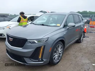 2021 Cadillac XT6 Sport with VIN 1GYKPGRS6MZ128112, listed as a IAAI auction lot 42415342 with 57,680 mi miles and . Bid and sale history available at DreamBid. Image 17.