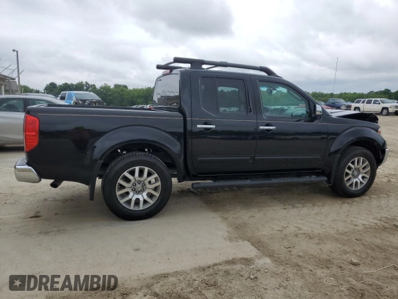 2011 Nissan Frontier Pro-4X with VIN 1N6AD0EVXBC433028, listed as a Copart auction lot 57653305 with 144,753 mi miles and Salvage title. Bid and sale history available at DreamBid. Image 3.