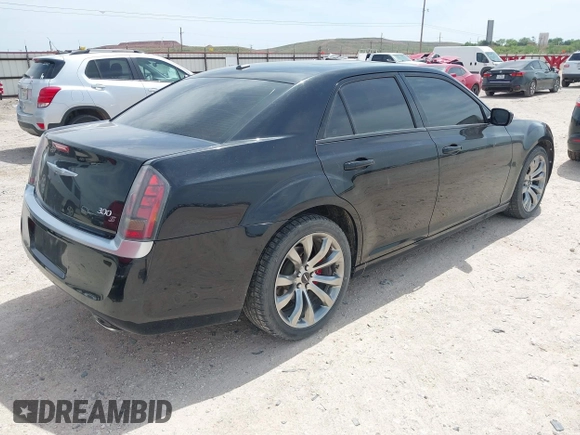2014 Chrysler 300 S with VIN 2C3CCABG8EH376795, listed as a IAAI auction lot 42038260 with 134,265 mi miles and . Bid and sale history available at carsss.com. Image 4.