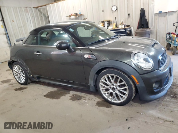 2012 MINI Coupe S z VIN WMWSX3C50CT154835, wystawiony jako Copart lot #76659984 z przebiegiem 122 425 mil mil oraz Szkoda całkowita • Salvage title. Historia ofert i sprzedaży dostępna na DreamBid. Obrazek 4.