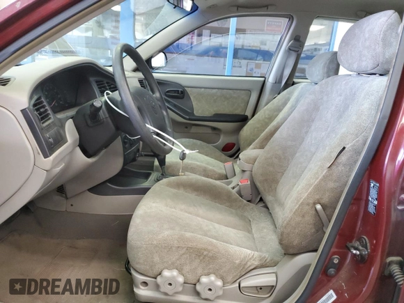 2001 Hyundai Elantra GLS with VIN KMHDN45D71U140221, listed as a Copart auction lot 54695955 with 107,725 mi miles and Salvage title. Bid and sale history available at DreamBid. Image 7.