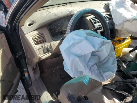 2000 Honda Accord EX с VIN 1HGCG1650YA077850, выставлен на аукционе Copart как лот 57105575 с пробегом Не указан миль и Списание • Salvage title. История ставок и продаж доступна на DreamBid. Изображение 9.