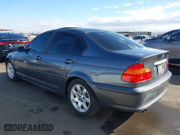 2002 BMW 3 Series 325i with VIN WBAET37482NG74460, listed as a IAAI auction lot 41712972 with 176,762 mi miles. Bid and sale history available at carsss.com. Image 3.