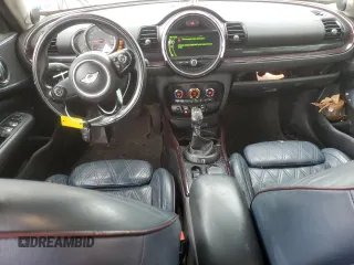 2016 MINI Clubman z VIN WMWLN5C56G2B28065, wystawiony jako Copart lot #54565825 z przebiegiem 129 270 mil mil oraz Szkoda całkowita • Salvage title. Historia ofert i sprzedaży dostępna na DreamBid. Obrazek 8.