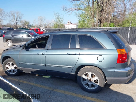 2006 Chrysler Pacifica Touring z VIN 2A4GM68476R725696, wystawiony jako IAAI lot #42003764 z przebiegiem Nie podano mil oraz . Historia ofert i sprzedaży dostępna na DreamBid. Obrazek 14.