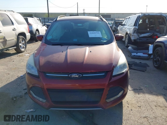 2015 Ford Escape SE with VIN 1FMCU9G93FUC32776, listed as a IAAI auction lot 41849714 with 135,875 mi miles. Bid and sale history available at carsss.com. Image 12.