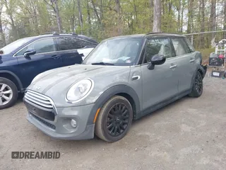 2015 MINI Hardtop 4 Door with VIN WMWXS5C57FT831660, listed as a IAAI auction lot 42057682 with 110,940 mi miles and . Bid and sale history available at DreamBid. Image 2.