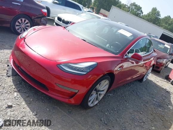 2020 Tesla Model 3 Standard Range Plus with VIN 5YJ3E1EA9LF708808, listed as a IAAI auction lot 40018323 with 32,069 mi miles. Bid and sale history available at carsss.com. Image 19.