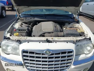 2006 Chrysler 300 C with VIN 2C3KA63H06H534666, listed as a IAAI auction lot 41892603 with 116,431 mi miles. Bid and sale history available at carsss.com. Image 10.