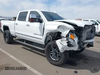 2016 GMC Sierra 2500HD Denali z VIN 1GT12UE88GF170375, wystawiony jako IAAI lot #41885873 z przebiegiem 150 108 mil mil oraz . Historia ofert i sprzedaży dostępna na DreamBid. Obrazek 1.