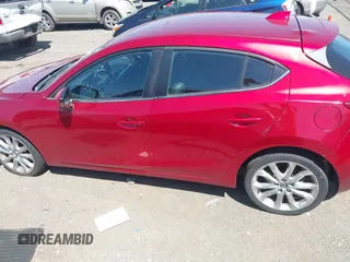 2014 Mazda 3 S Touring with VIN JM1BM1L36E1139818, listed as a IAAI auction lot 42052687 with 134,397 mi miles and . Bid and sale history available at DreamBid. Image 14.