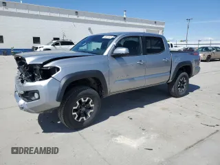2021 Toyota Tacoma SR with VIN 5TFCZ5AN5MX260143, listed as a Copart auction lot 55047845 with 83,793 mi miles and Salvage title. Bid and sale history available at DreamBid. Image 1.