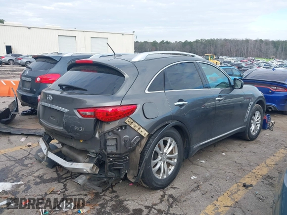 2013 Infiniti FX with VIN JN8CS1MU8DM141556, listed as a IAAI auction lot 41536047 with 96,016 mi miles and . Bid and sale history available at DreamBid. Image 4.