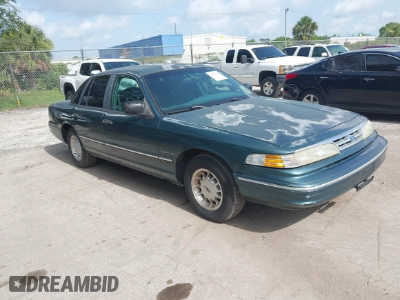 1995 Ford Crown Victoria LX с VIN 2FALP74W9SX120258, выставлен на аукционе IAAI как лот 42414057 с пробегом 210 215 миль миль и . История ставок и продаж доступна на DreamBid. Изображение 1.