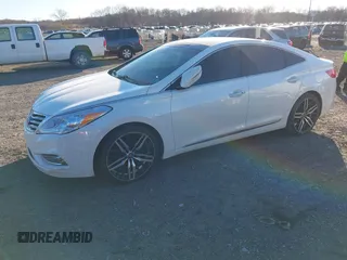 2012 Hyundai Azera with VIN KMHFH4JG0CA162291, listed as a IAAI auction lot 41012822 with 205,531 mi miles. Bid and sale history available at carsss.com. Image 2.