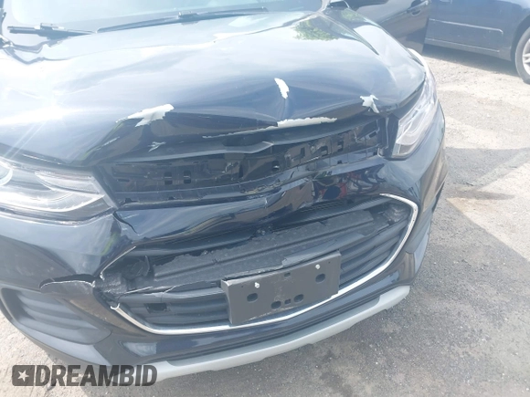 2021 Chevrolet Trax LT with VIN KL7CJPSM5MB374551, listed as a IAAI auction lot 42433565 with 54,367 mi miles and . Bid and sale history available at DreamBid. Image 6.