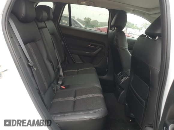 2025 Mazda CX-50 S Premium z VIN 7MMVABDM9SN331032, wystawiony jako Copart lot #60797015 z przebiegiem 9 572 mil mil oraz Nie do naprawy • Non repairable. Historia ofert i sprzedaży dostępna na DreamBid. Obrazek 11.