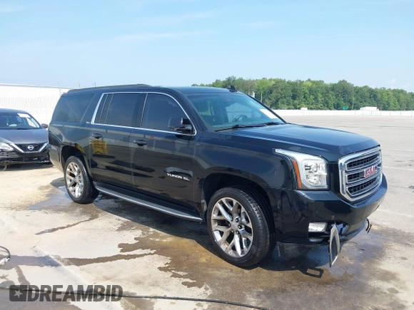 2016 GMC Yukon XL SLE with VIN 1GKS1FKC9GR161876, listed as a IAAI auction lot 39948106 with 60,800 mi miles. Bid and sale history available at carsss.com. Image 1.