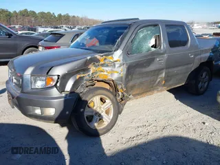 2010 Honda Ridgeline RTL with VIN 5FPYK1F52AB004678, listed as a IAAI auction lot 41661968 with 169,021 mi miles. Bid and sale history available at carsss.com. Image 2.