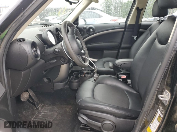2015 MINI Countryman with VIN WMWZB3C59FWR42965, listed as a Copart auction lot 55329785 with 56,641 mi miles and Clean Title. Bid and sale history available at DreamBid. Image 7.