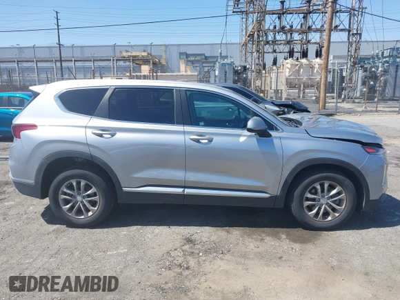 2020 Hyundai Santa Fe SE with VIN 5NMS23AD2LH220153, listed as a IAAI auction lot 42344499 with 28,346 mi miles and . Bid and sale history available at DreamBid. Image 14.