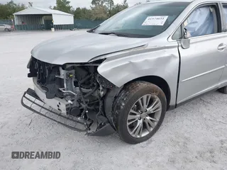 2013 Lexus RX 450h with VIN JTJZB1BA8D2008237, listed as a IAAI auction lot 41574651 with 106,732 mi miles and . Bid and sale history available at DreamBid. Image 18.