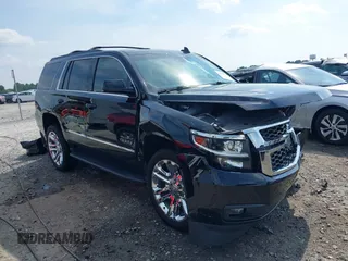 2019 Chevrolet Tahoe LT with VIN 1GNSKBKC1KR321573, listed as a IAAI auction lot 42586301 with 124,058 mi miles and . Bid and sale history available at DreamBid. Image 1.