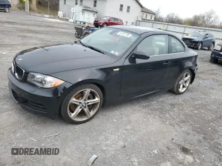 2009 BMW 1 Series 135i with VIN WBAUC73519VK79934, listed as a Copart auction lot 50781795 with 96,817 mi miles and Salvage title. Bid and sale history available at DreamBid. Image 1.