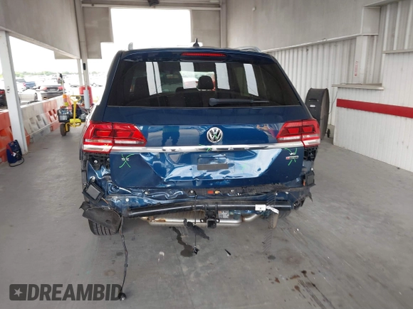 2019 Volkswagen Atlas SE with VIN 1V2LR2CAXKC605369, listed as a IAAI auction lot 39617117 with 74,432 mi miles and . Bid and sale history available at DreamBid. Image 17.
