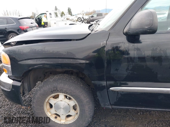 2004 GMC Sierra 1500 SLT with VIN 1GTEK19T74E400259, listed as a IAAI auction lot 41091044 with 173,726 mi miles. Bid and sale history available at carsss.com. Image 6.