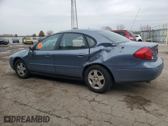 2000 Ford Taurus SEL with VIN 1FAFP56S2YG160062, listed as a Copart auction lot 82297744 with 97,218 mi miles and Salvage title. Bid and sale history available at DreamBid. Image 2.