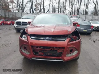 2015 Ford Escape Titanium with VIN 1FMCU9J98FUC90018, listed as a IAAI auction lot 41671941 with 102,335 mi miles. Bid and sale history available at carsss.com. Image 6.