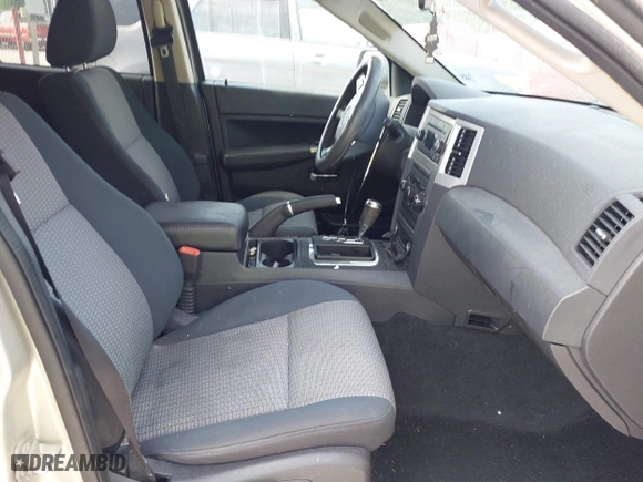 2010 Jeep Grand Cherokee Laredo with VIN 1J4PS4GK6AC136702, listed as a IAAI auction lot 42066484 with 126,509 mi miles. Bid and sale history available at carsss.com. Image 5.