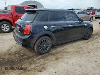 2019 MINI Hardtop 4 Door Cooper S с VIN WMWXU3C58K2H87220, выставлен на аукционе Copart как лот 55775665 с пробегом 54 404 миль миль и Списание • Salvage title. История ставок и продаж доступна на DreamBid. Изображение 3.
