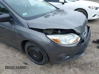 2012 Ford Focus S with VIN 1FAHP3E23CL306547, listed as a IAAI auction lot 41831357 with 187,629 mi miles and . Bid and sale history available at DreamBid. Image 13.
