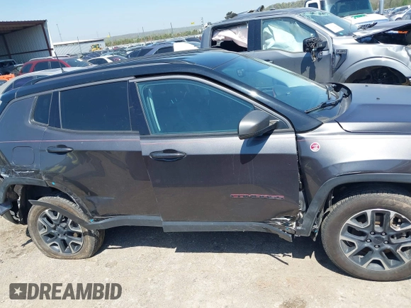 2021 Jeep Compass Trailhawk with VIN 3C4NJDDB8MT529176, listed as a IAAI auction lot 41984762 with 122,412 mi miles and . Bid and sale history available at DreamBid. Image 14.