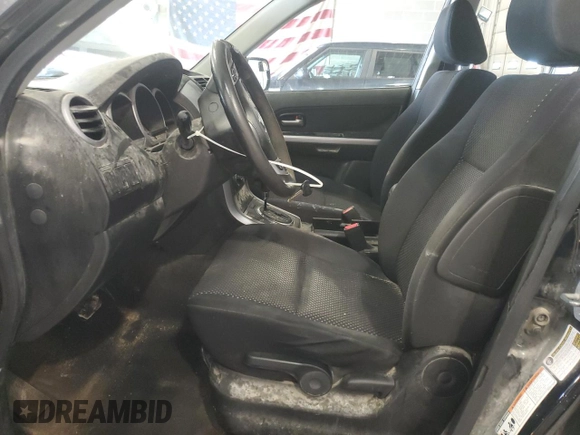 2008 Suzuki Grand Vitara w/Spare & Cargo Covers z VIN JS3TD941584102389, wystawiony jako Copart lot #55044795 z przebiegiem 193 680 mil mil oraz Szkoda całkowita • Salvage title. Historia ofert i sprzedaży dostępna na DreamBid. Obrazek 7.