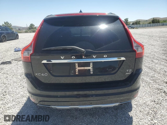2015 Volvo XC60 T5 z VIN YV4612RK7F2716797, wystawiony jako Copart lot #58010425 z przebiegiem 49 647 mil mil oraz Szkoda całkowita • Salvage title. Historia ofert i sprzedaży dostępna na DreamBid. Obrazek 6.