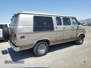1994 GMC Vandura z VIN 1GDEG25K4RF512695, wystawiony jako Copart lot #63562414 z przebiegiem 171 855 mil mil oraz Szkody całkowita. Historia ofert i sprzedaży dostępna na DreamBid. Obrazek 3.