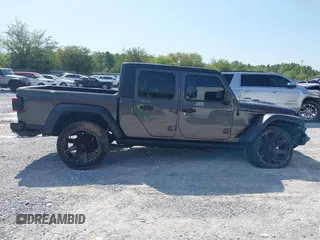 2020 Jeep Gladiator Rubicon with VIN 1C6JJTBG0LL187537, listed as a IAAI auction lot 42018914 with 53,443 mi miles and . Bid and sale history available at DreamBid. Image 14.