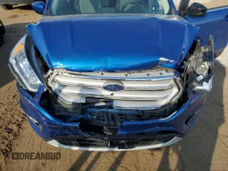 2019 Ford Escape SE z VIN 1FMCU9GDXKUB24265, wystawiony jako Copart lot #54052855 z przebiegiem 60 479 mil mil oraz Czysty tytuł • Clean title. Historia ofert i sprzedaży dostępna na DreamBid. Obrazek 12.