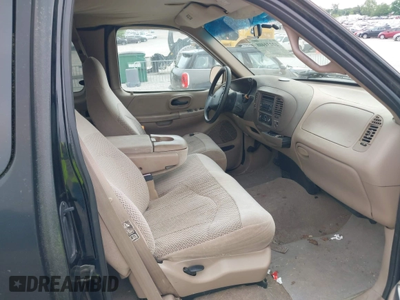 1999 Ford F-150 with VIN 1FTRX17W8XNA81054, listed as a IAAI auction lot 42234408 with Not provided miles and . Bid and sale history available at DreamBid. Image 5.